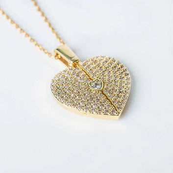 Elegant gold open close heart necklace