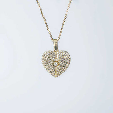 Elegant gold open close heart necklace